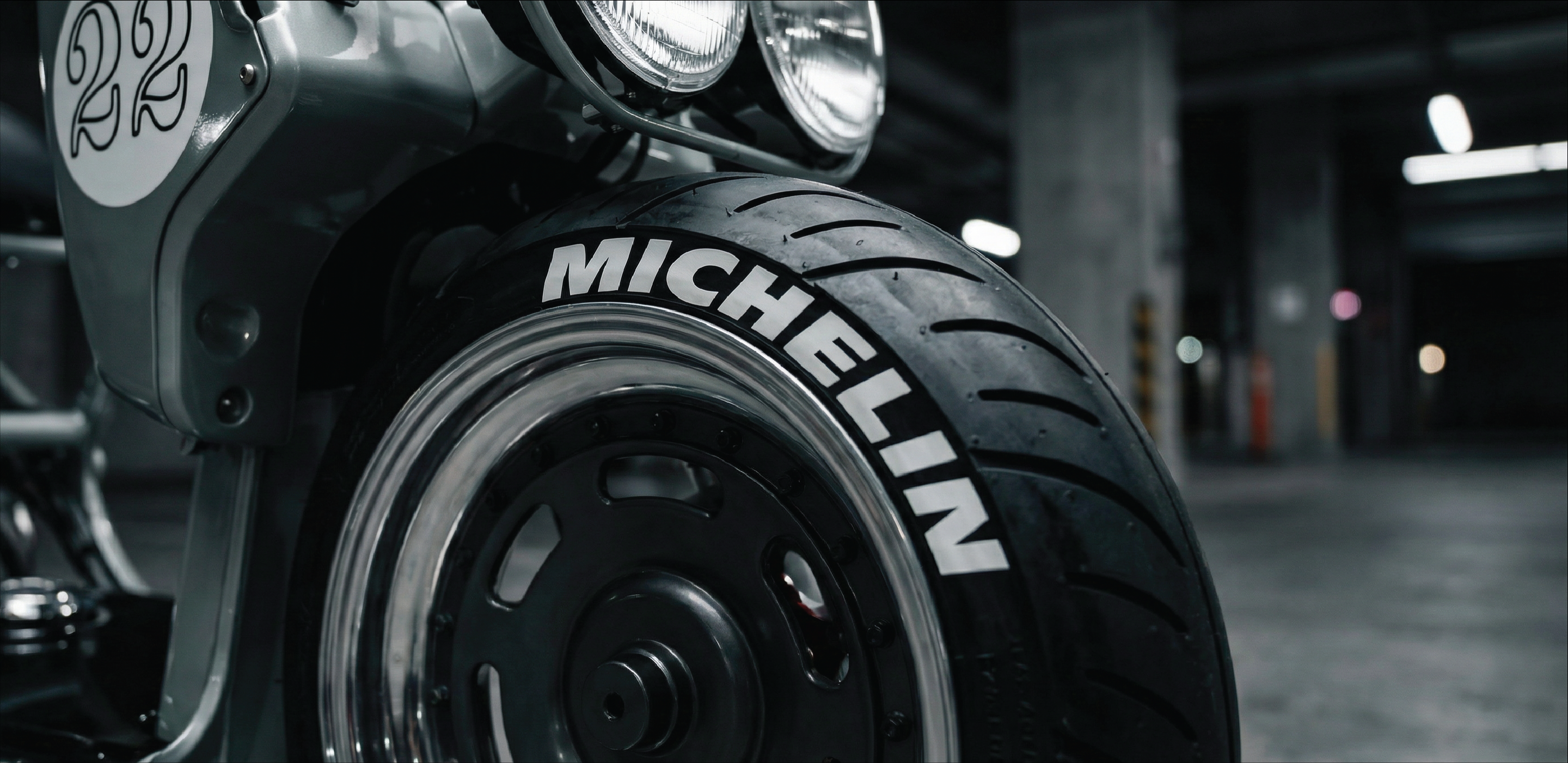 real Michelin tire stickers on a motorcycle in an indoor setting